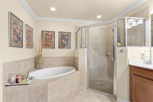 bathroom with ornamental molding, a garden tub, tile patterned flooring, vanity, and a shower stall