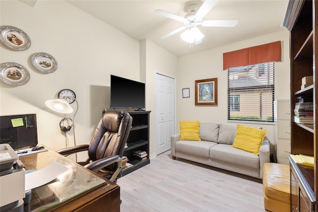 office area featuring light wood-style floors and ceiling fan