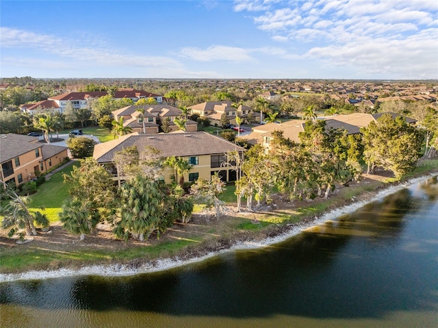 aerial view featuring a water view and a residential view