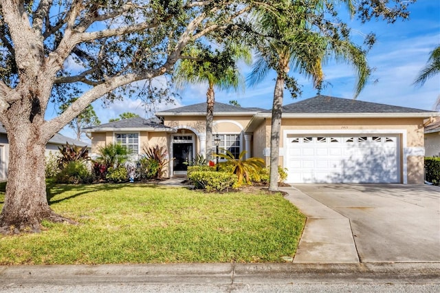 ranch-style house with a front lawn, a garage, driveway, and stucco siding