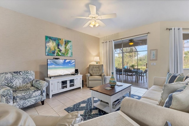 living area featuring wallpapered walls, light tile patterned flooring, a healthy amount of sunlight, and ceiling fan