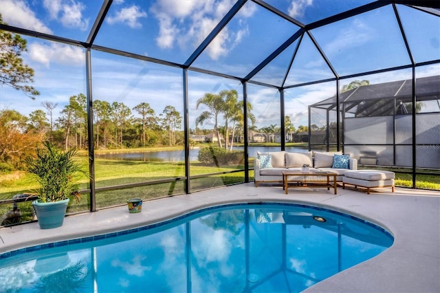 outdoor pool with a patio area, glass enclosure, outdoor lounge area, and a water view