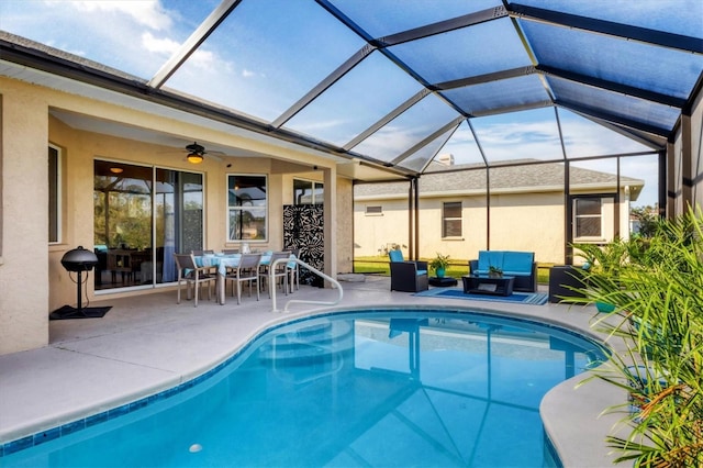 pool with an outdoor living space, ceiling fan, a lanai, outdoor dining area, and a patio area