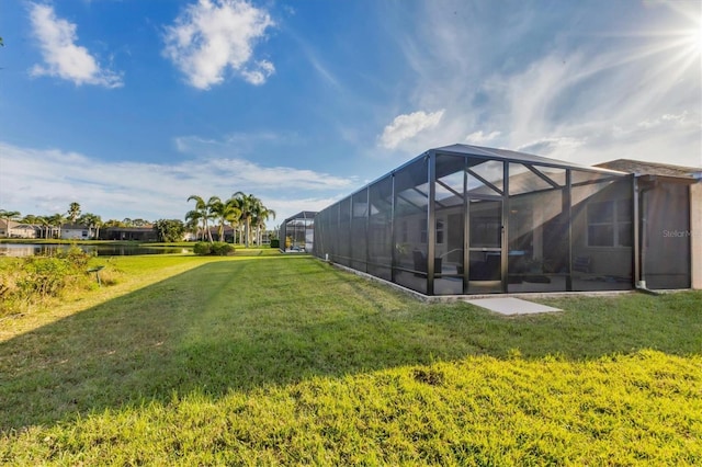 view of yard featuring a lanai