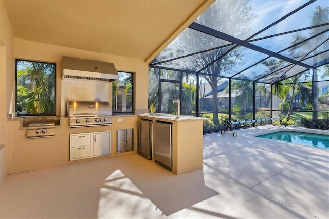 view of patio with an outdoor kitchen, a sink, a grill, a lanai, and an outdoor pool