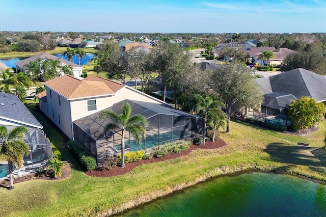 aerial view with a water view and a residential view