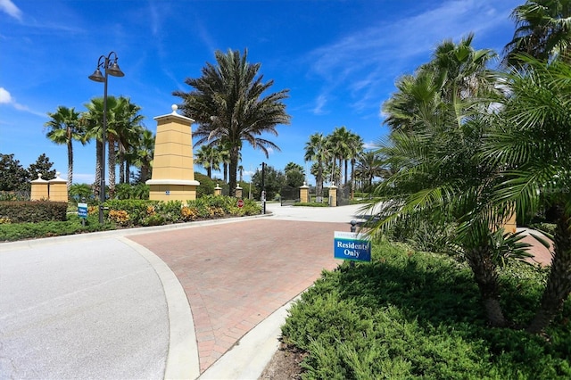 surrounding community featuring a gate