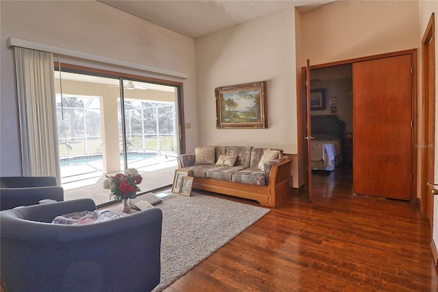 living area with dark wood-style flooring