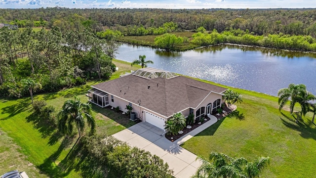 bird's eye view featuring a water view and a wooded view