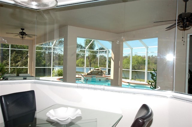 unfurnished sunroom with a pool