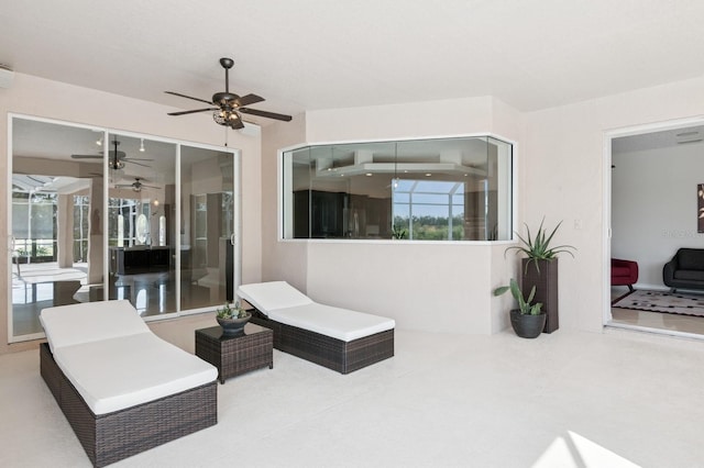 view of patio with ceiling fan