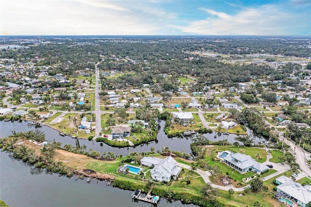 aerial view featuring a residential view and a water view