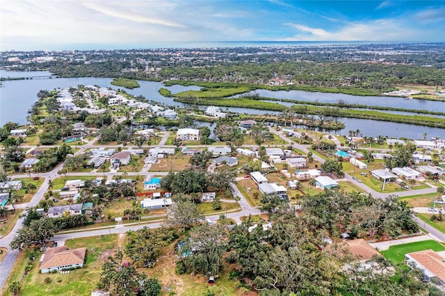 aerial view with a water view and a residential view