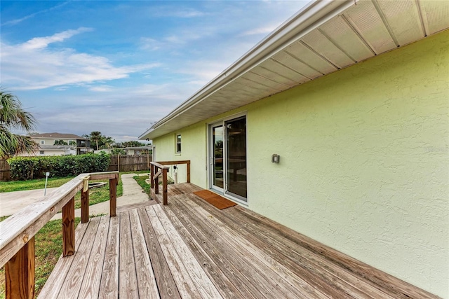 wooden deck featuring fence