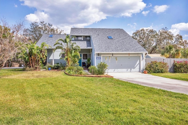 view of front of home with concrete driveway, roof with shingles, a front yard, and fence