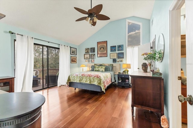 bedroom featuring lofted ceiling, access to outside, a ceiling fan, and wood finished floors