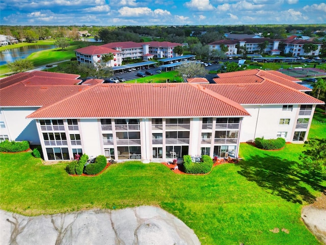 bird's eye view with a water view