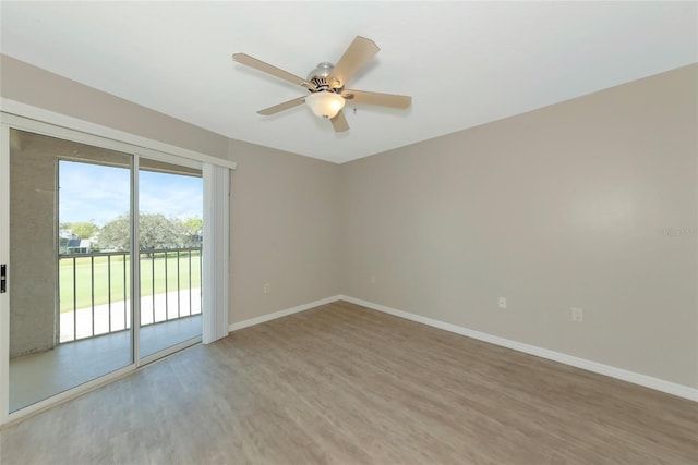 unfurnished room with light wood-style flooring, baseboards, and ceiling fan