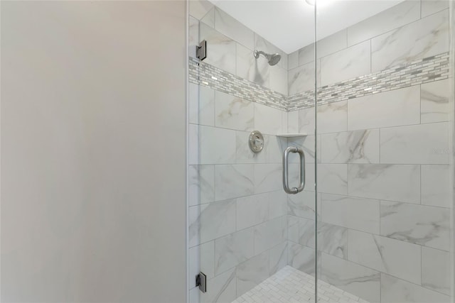 full bathroom with a shower stall