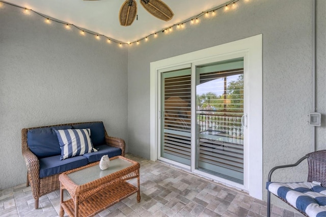 view of patio featuring outdoor lounge area and a ceiling fan