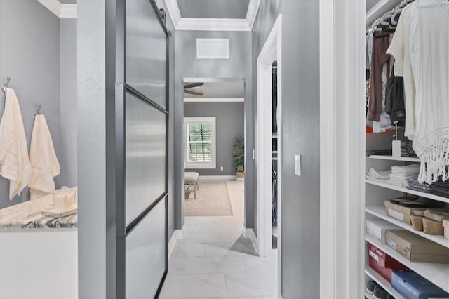 spacious closet featuring marble finish floor