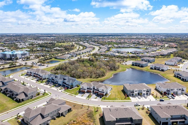 bird's eye view with a water view and a residential view