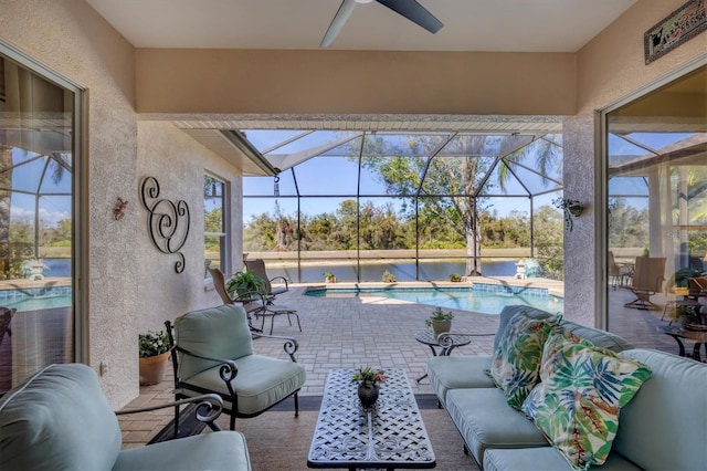 view of patio featuring glass enclosure, an outdoor pool, and an outdoor hangout area