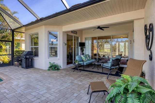 view of patio / terrace featuring an outdoor living space, grilling area, a lanai, and a ceiling fan