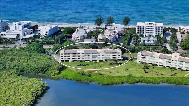 bird's eye view with a water view