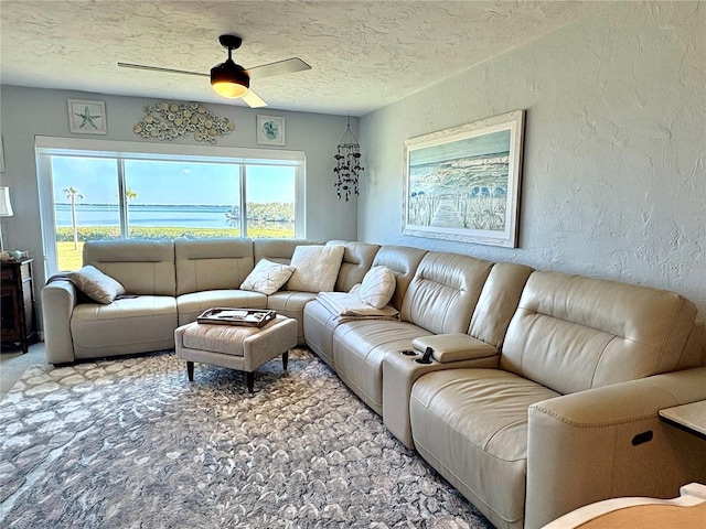 4600 Gulf Of Mexico Dr Unit 202, Longboat Key, FL 34228 - carpeted living area featuring a ceiling fan, a textured wall, and a textured ceiling
