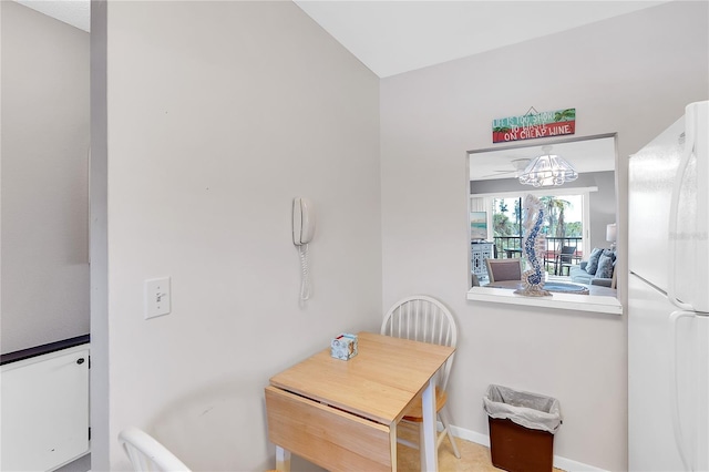 dining space featuring baseboards