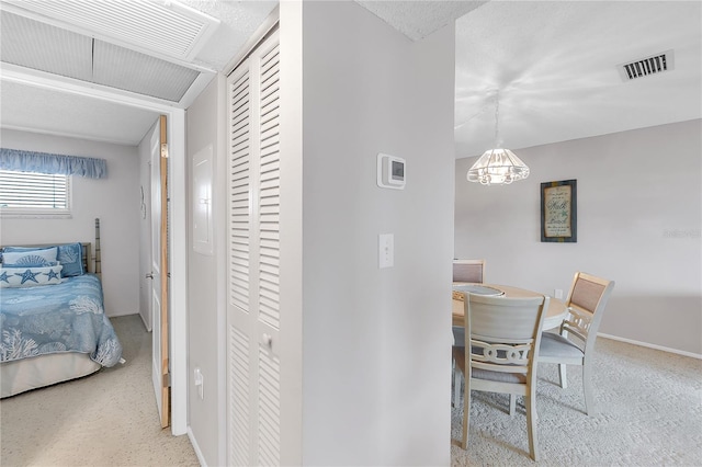 interior space with baseboards and visible vents