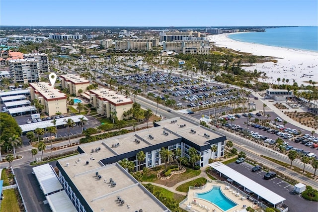 bird's eye view with a view of city, a water view, and a view of the beach