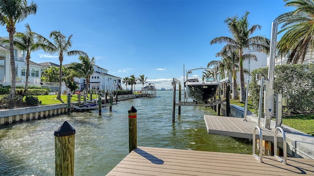 view of dock featuring a water view and boat lift