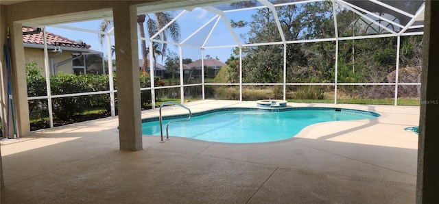 outdoor pool featuring a patio and a lanai