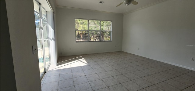 unfurnished room with ornamental molding, visible vents, baseboards, and a ceiling fan