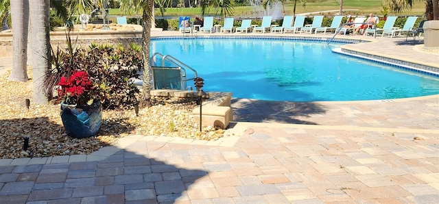 pool with a patio