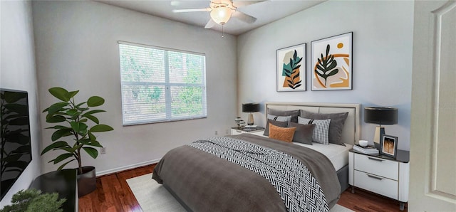 bedroom with wood finished floors, baseboards, and ceiling fan