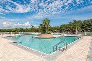 community pool featuring a patio