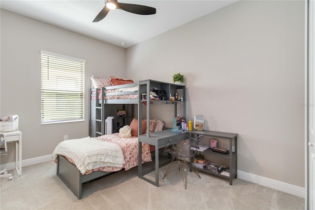 bedroom featuring carpet floors, ceiling fan, and baseboards