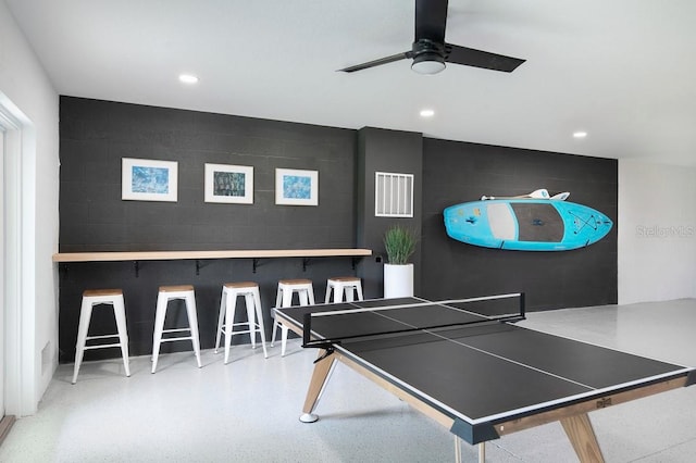 playroom with ceiling fan, concrete block wall, visible vents, and recessed lighting