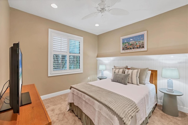 bedroom featuring recessed lighting, ceiling fan, baseboards, and light colored carpet