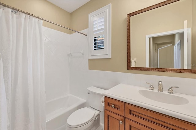 full bath featuring shower / bath combination with curtain, vanity, toilet, and tile walls