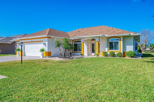 view of front of property featuring stucco siding, a front lawn, concrete driveway, a shingled roof, and a garage