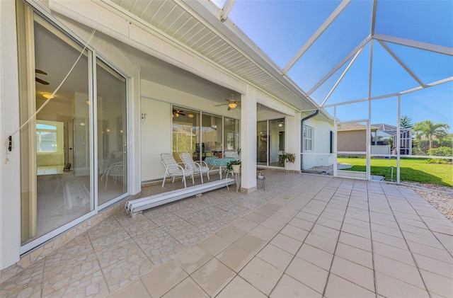 exterior space with lofted ceiling with beams and ceiling fan