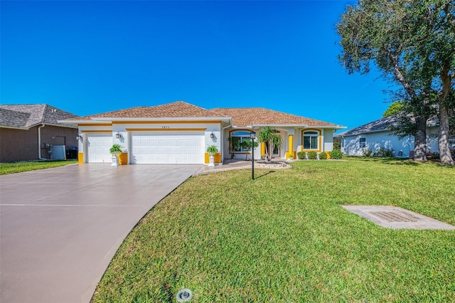 5872 Mckinley Rd, Venice, FL 34293 - ranch-style house featuring an attached garage, a front lawn, stucco siding, and driveway