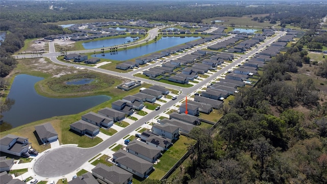 bird's eye view with a water view and a residential view