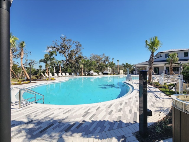 pool featuring a patio area