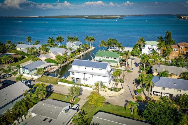 aerial view with a residential view and a water view