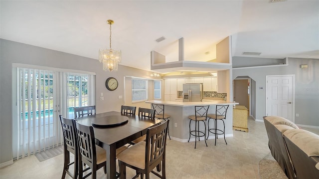 dining area featuring arched walkways, lofted ceiling, visible vents, baseboards, and an inviting chandelier